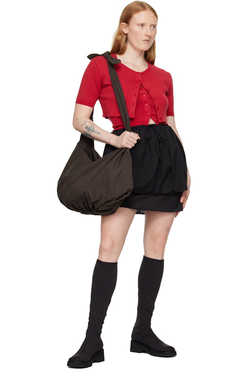 Nylon ripstop shoulder bag in brown. 

· Detachable self-tie strap at twin carry handles
· Logo flag at interior
· Taffeta lining
· Panel at base
· H15" x W21" x D4"

Available exclusively at SSENSE.

Supplier color: Brown
