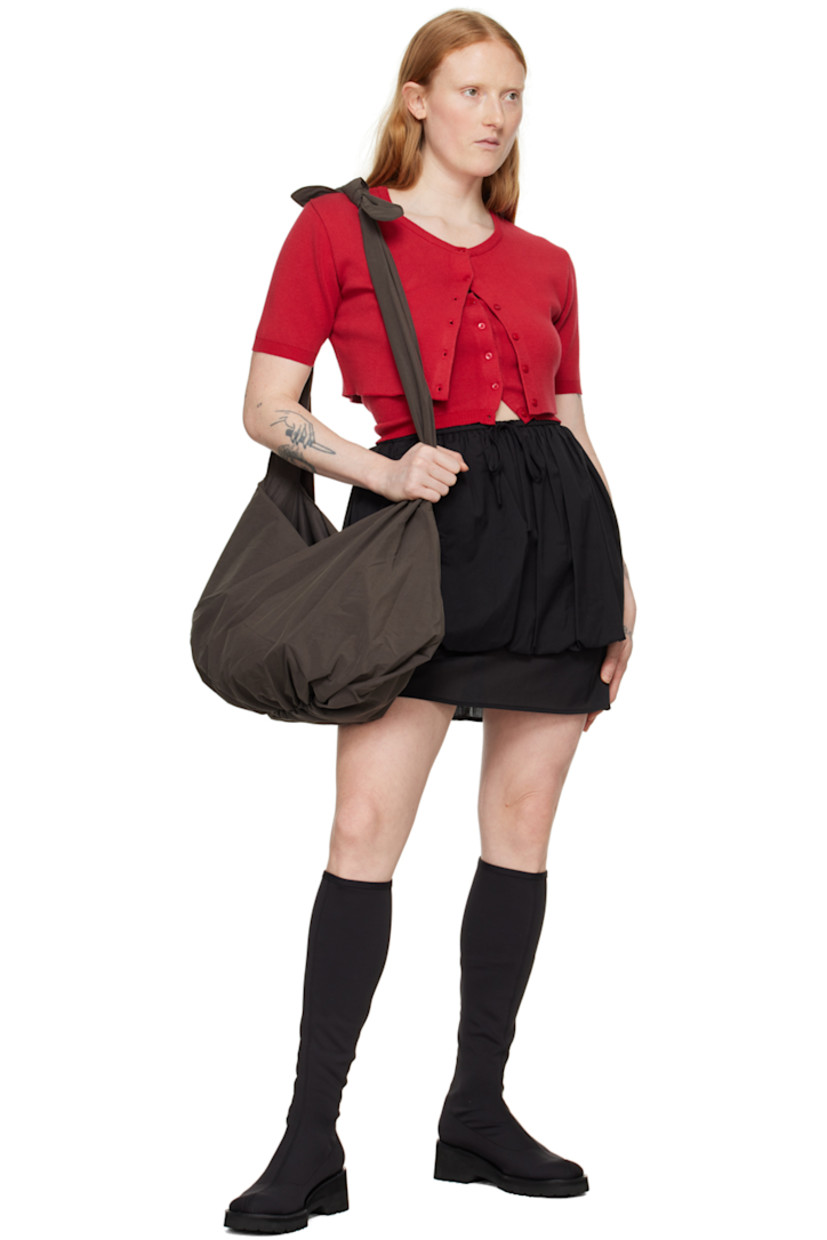 Cotton broadcloth skirt. Shirring throughout. 

· Layered construction
· Drawstring at elasticized waistband
· Slit at side seams
· Full cotton broadcloth lining

Supplier color: Black