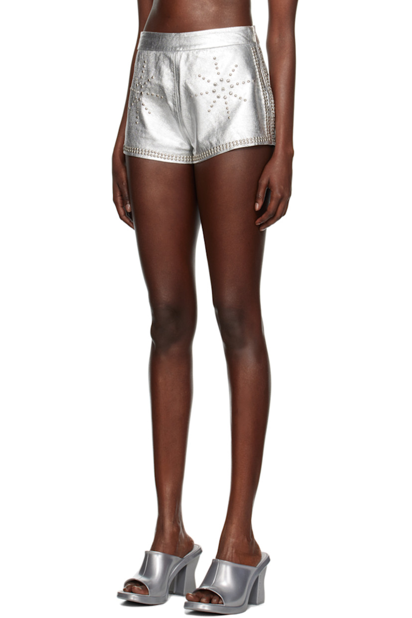 Foil-coated grained lambskin shorts. Studs throughout.

· Crystal-cut accents and graphics at front
· Zip closure at outseam
· Darts and text at back
· Full plain-woven stretch cotton lining

Available exclusively at SSENSE.

Part of the I'm Sorry by Petra Collins x Mimi Wade collaboration.

Supplier color: Silver