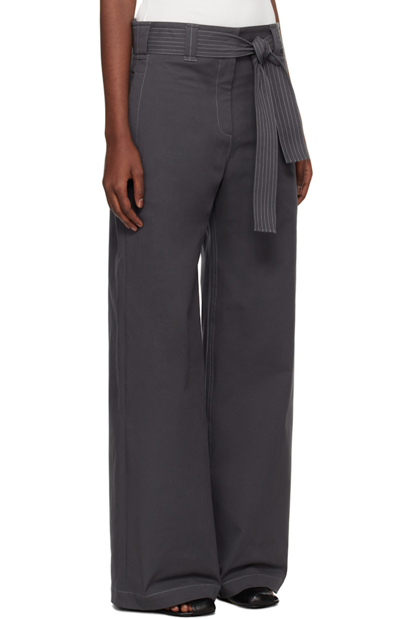 Straight-leg heavyweight deadstock stretch cotton twill trousers.

· Belt loops and detachable self-tie belt 
· Four-pocket styling
· Zip-fly
· Contrast stitching in white

Part of the Elemental 06 collection. 

Supplier color: Cement