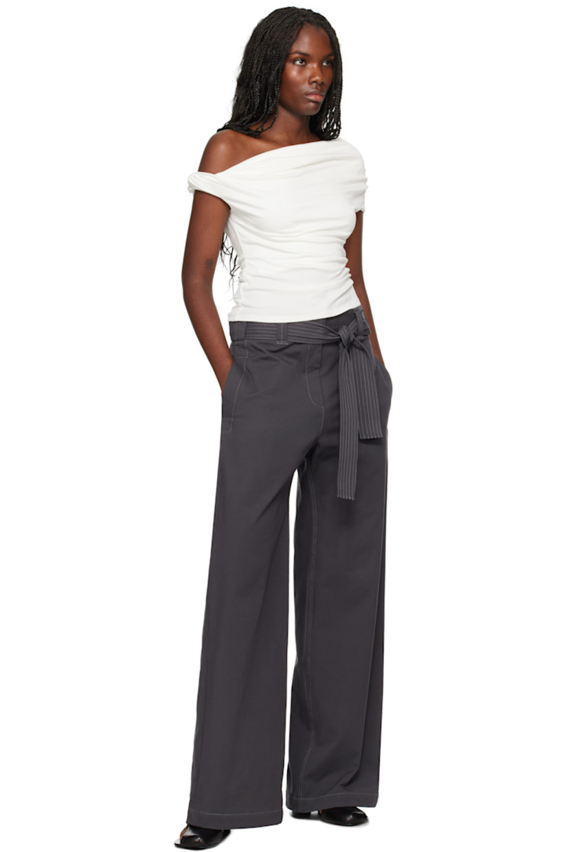 Straight-leg heavyweight deadstock stretch cotton twill trousers.

· Belt loops and detachable self-tie belt 
· Four-pocket styling
· Zip-fly
· Contrast stitching in white

Part of the Elemental 06 collection. 

Supplier color: Cement