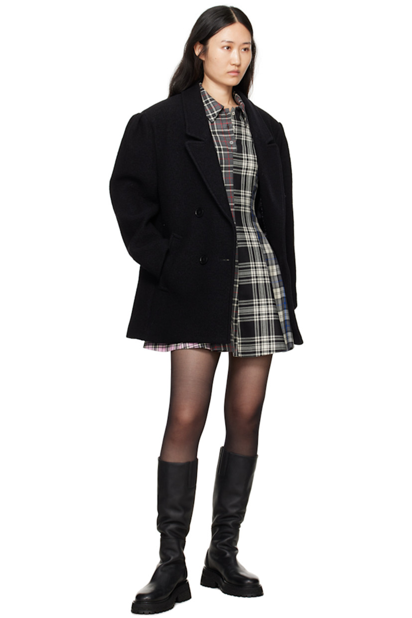 Oversized virgin wool bouclé coat. 

· Notched lapel
· Double-breasted button closure
· Welt pockets
· Padded shoulders
· Logo patch at back collar
· Button tab at back
· Twin vents at back hem
· Full logo-woven viscose satin lining

Supplier color: Black
