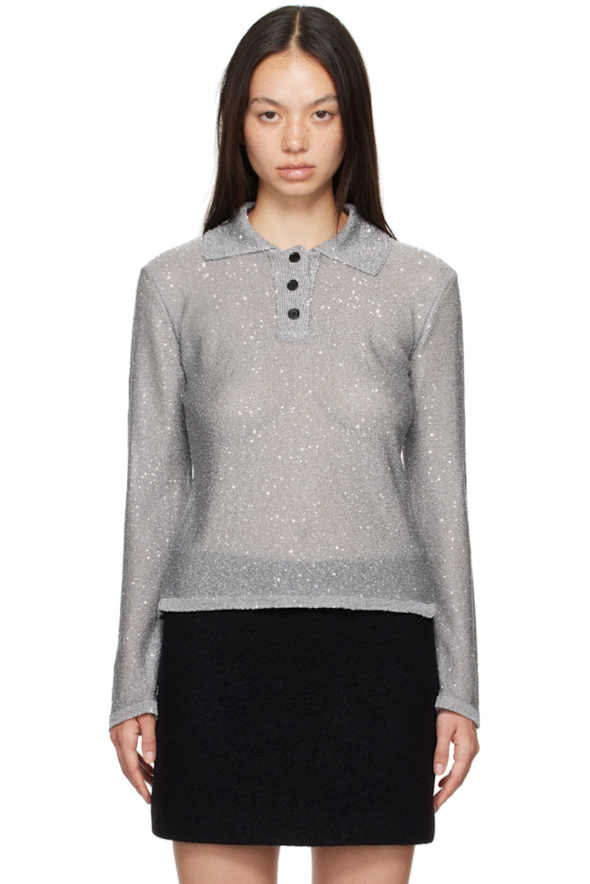 Knit polyester polo. Sequins throughout. 

· Rib knit spread collar, hem, and cuffs
· Three-button placket
· Unlined

Supplier color: Grey