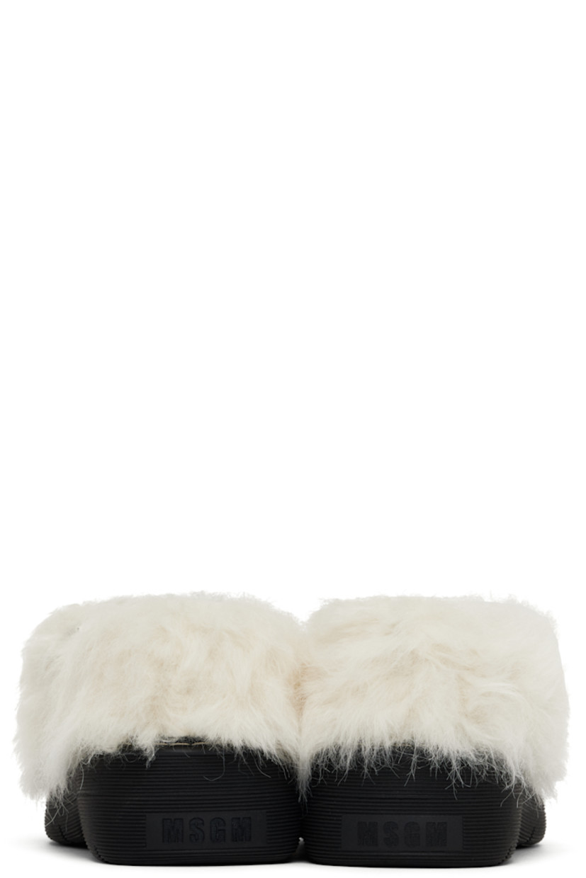 Faux-fur Mary Jane-style loafers in off-white.

· Pin-buckle strap at vamp
· Logo patch at padded footbed
· Buffed calfskin lining
· Topstitching at welt
· Logo embossed at platform rubber midsole
· Treaded rubber sole
· Platform: H1.5"

Supplier color: Off white