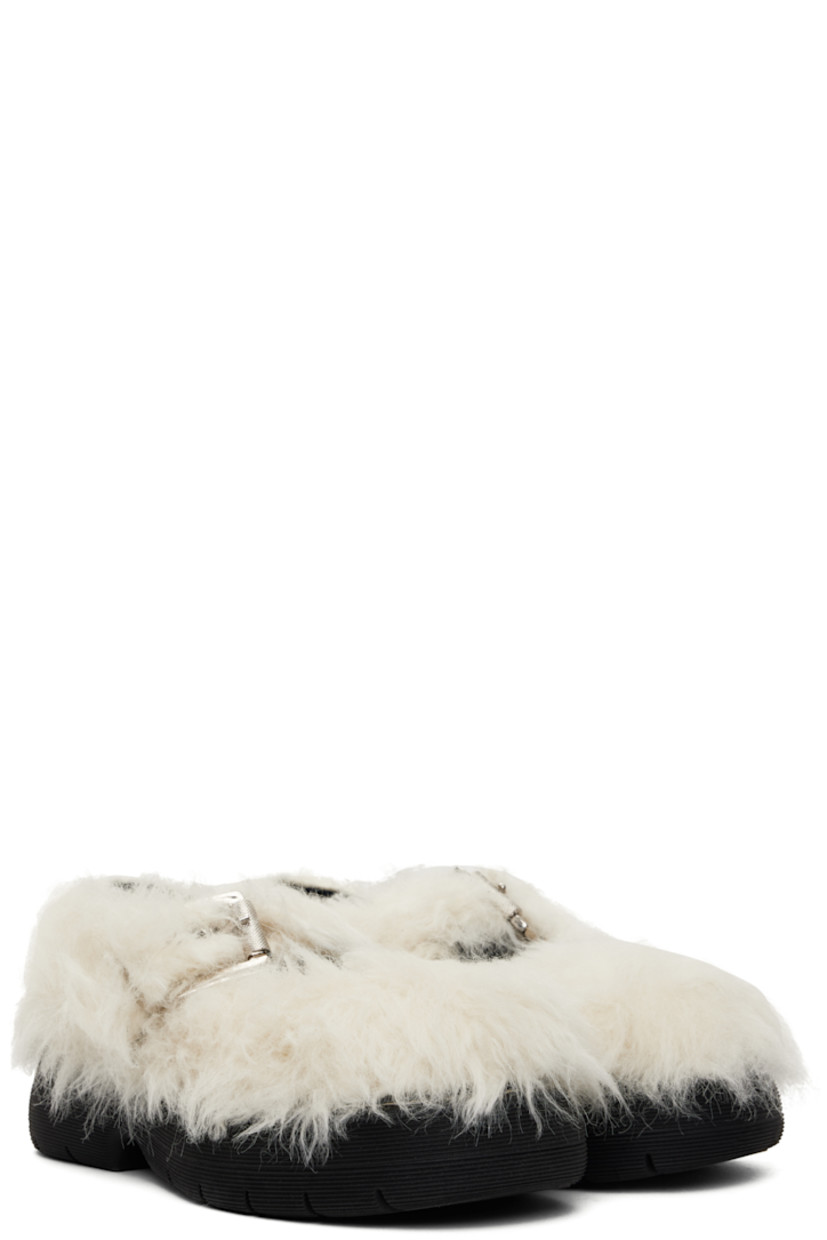 Faux-fur Mary Jane-style loafers in off-white.

· Pin-buckle strap at vamp
· Logo patch at padded footbed
· Buffed calfskin lining
· Topstitching at welt
· Logo embossed at platform rubber midsole
· Treaded rubber sole
· Platform: H1.5"

Supplier color: Off white