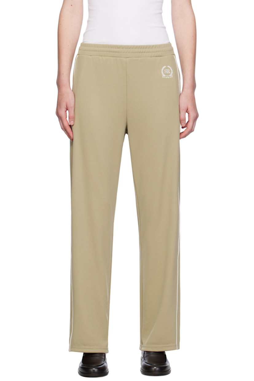 COOLMAX® EcoMade polyester-blend piqué track pants.

· Concealed drawstring at elasticized waistband
· Two-pocket styling
· Logo graphic embroidered at front
· Piping at outseams

Supplier color: Elephant