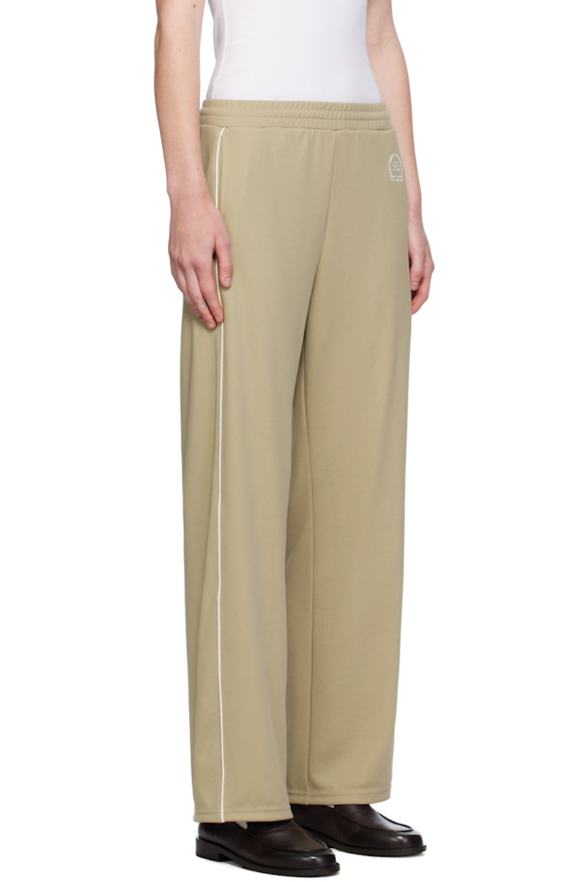 COOLMAX® EcoMade polyester-blend piqué track pants.

· Concealed drawstring at elasticized waistband
· Two-pocket styling
· Logo graphic embroidered at front
· Piping at outseams

Supplier color: Elephant