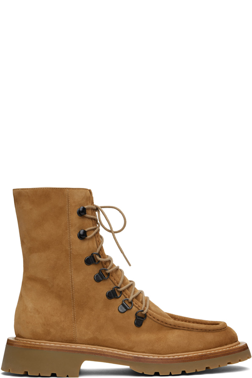 Ankle-high suede boots in tan. 

· Moc toe 
· Lace-up closure
· Buffed leather lining
· Topstitching at welt
· Stacked leather midsole
· Treaded foam rubber sole

Supplier color: Hazelnut