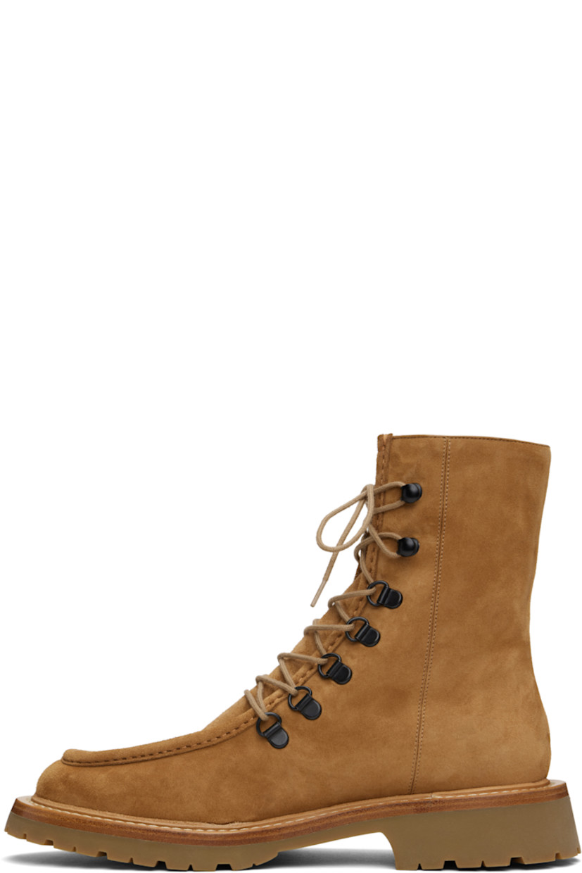 Ankle-high suede boots in tan. 

· Moc toe 
· Lace-up closure
· Buffed leather lining
· Topstitching at welt
· Stacked leather midsole
· Treaded foam rubber sole

Supplier color: Hazelnut