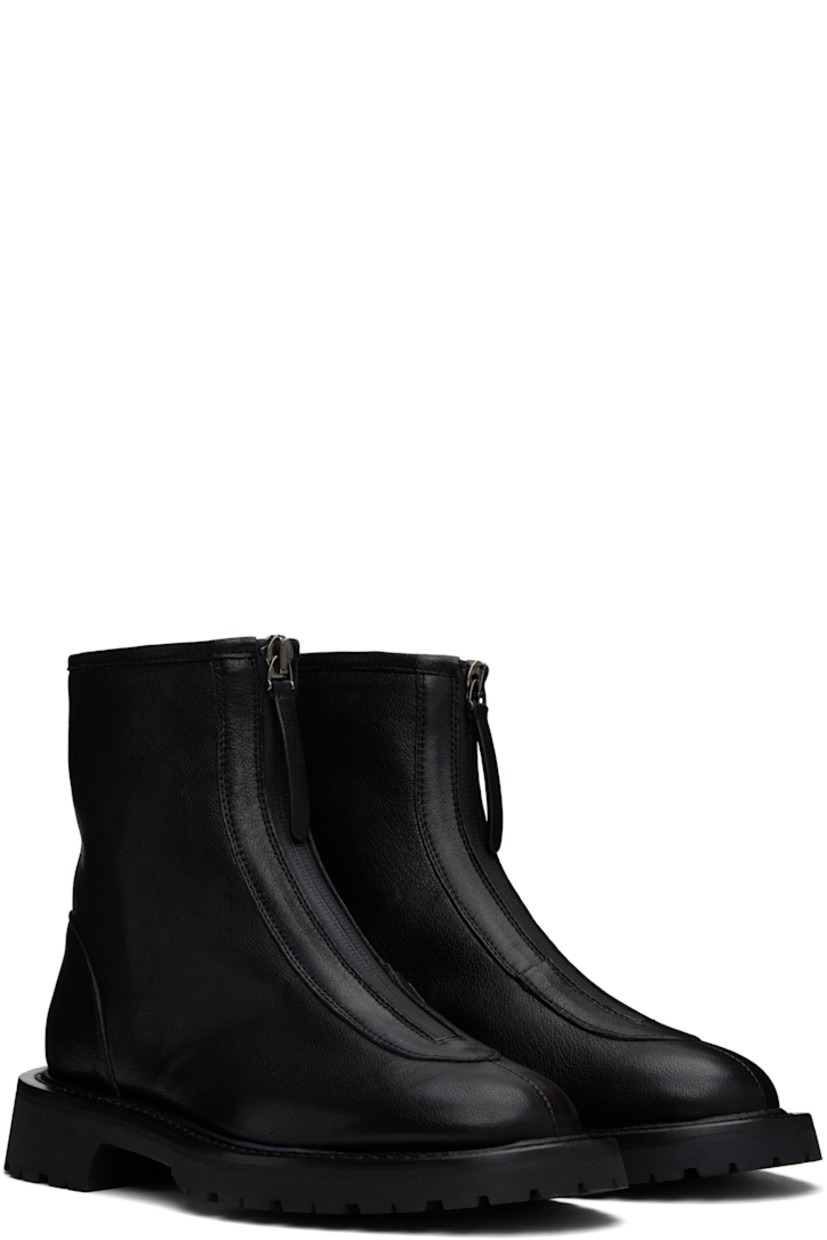 Ankle-high grained leather boots in black.

· Almond toe 
· Zip closure at vamp
· Grained leather lining
· Topstitching at welt 
· Treaded foam rubber sole

Supplier color: Black