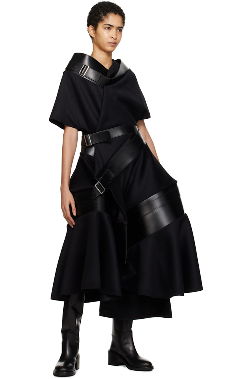 Knee-high buffed calfskin boots in black. 

· Buffed leather lining 
· Topstitching at welt 
· Stacked leather midsole 
· Stacked leather block heel with rubber injection 
· Leather sole 
· Heel: H2.5"

Supplier color: Black