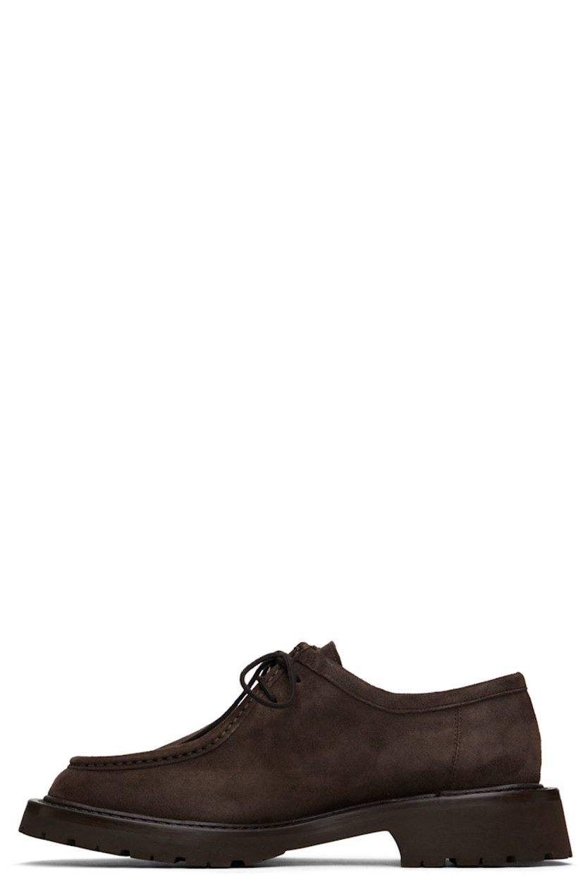 Suede derbys in brown.

· Moc toe
· Lace-up closure
· Buffed leather lining 
· Stacked leather midsole
· Treaded rubber sole
· Heel: H1.5"

Supplier color: Dark brown