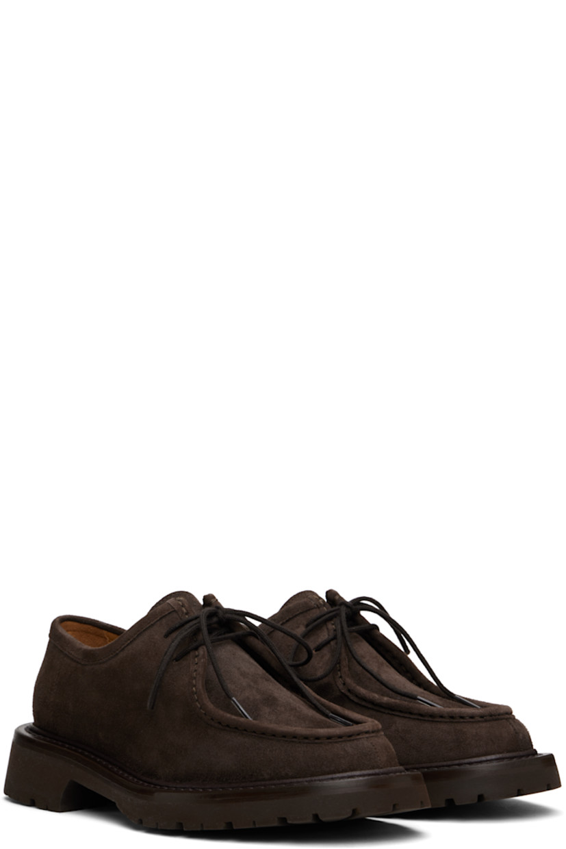 Suede derbys in brown.

· Moc toe
· Lace-up closure
· Buffed leather lining 
· Stacked leather midsole
· Treaded rubber sole
· Heel: H1.5"

Supplier color: Dark brown