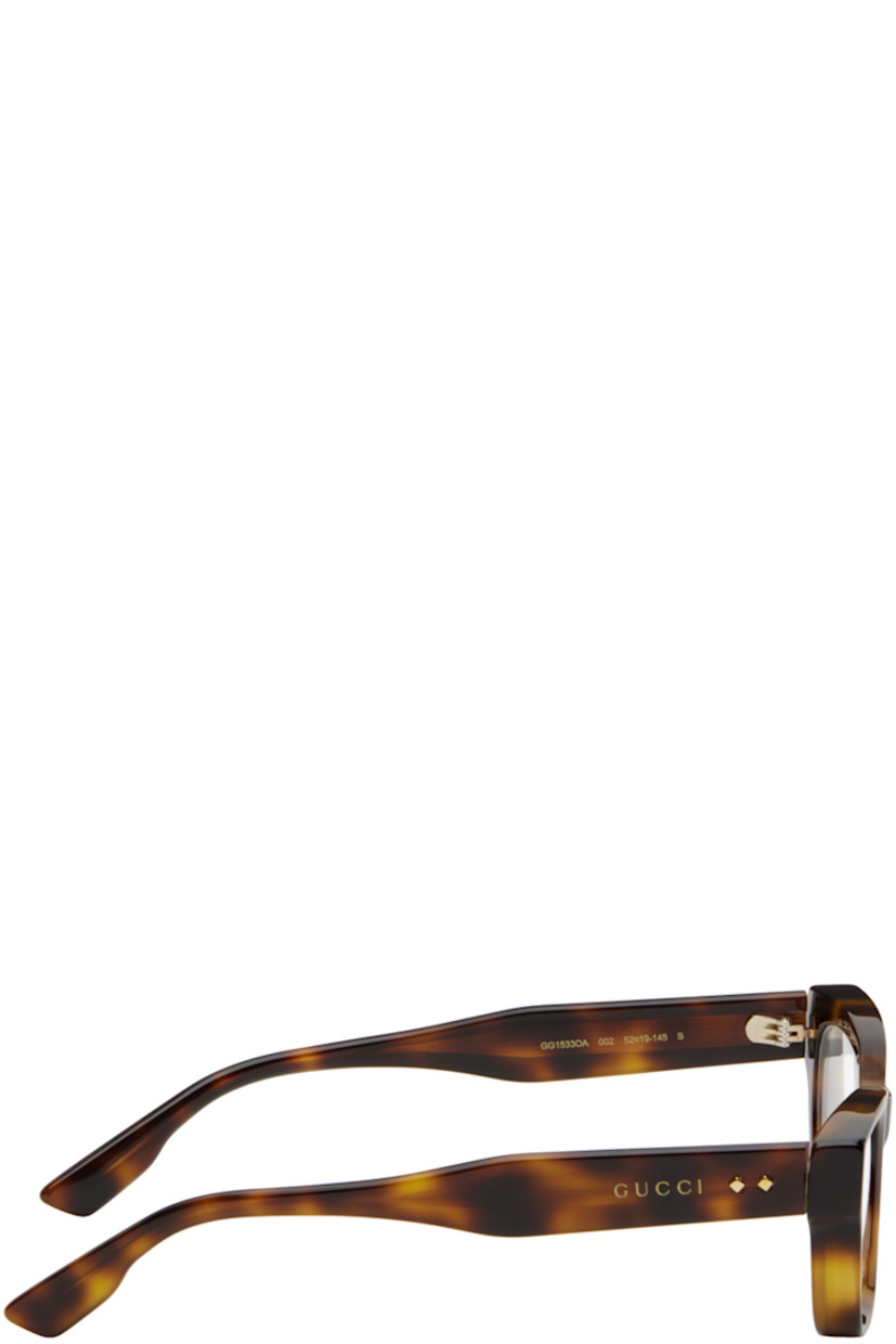 Square acetate-frame optical glasses in tortoiseshell.

· Integrated nose pads
· Logo hardware at temples
· Includes velvet hardside case
· Size: 52.19 145

Supplier color: Havana
