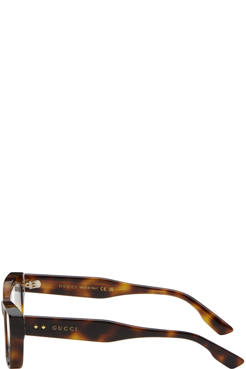 Square acetate-frame optical glasses in tortoiseshell.

· Integrated nose pads
· Logo hardware at temples
· Includes velvet hardside case
· Size: 52.19 145

Supplier color: Havana