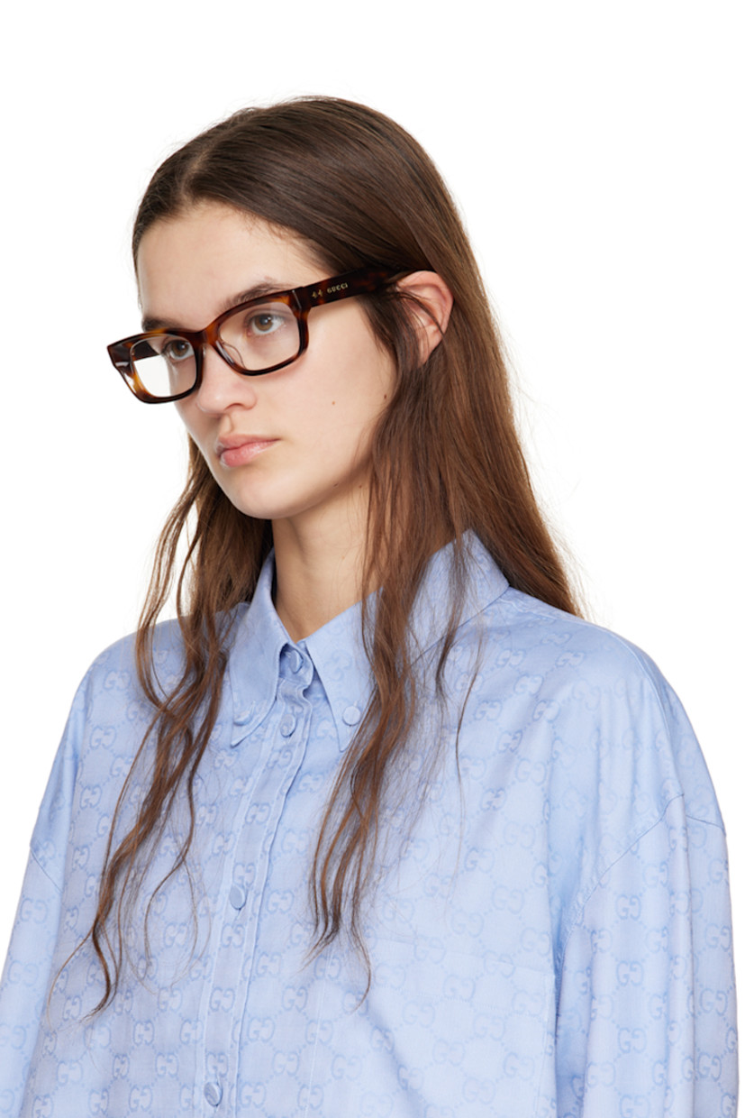 Square acetate-frame optical glasses in tortoiseshell.

· Integrated nose pads
· Logo hardware at temples
· Includes velvet hardside case
· Size: 52.19 145

Supplier color: Havana