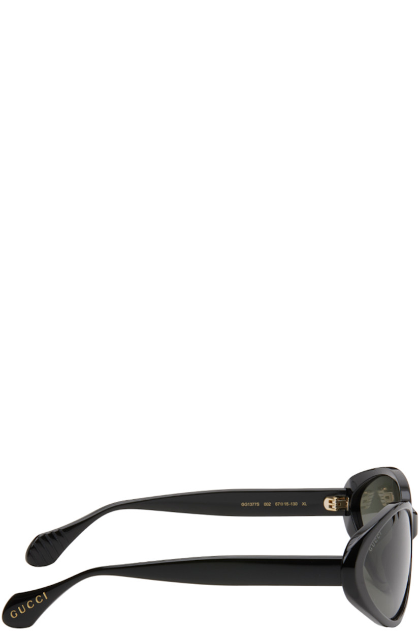 Cat-eye acetate-frame sunglasses in black.

· Gray lenses
· Logo etched at lens
· Integrated nose pads
· Inset logo hardware at temple tips
· Includes case
· Size: 67.15 130

Supplier color: Black
