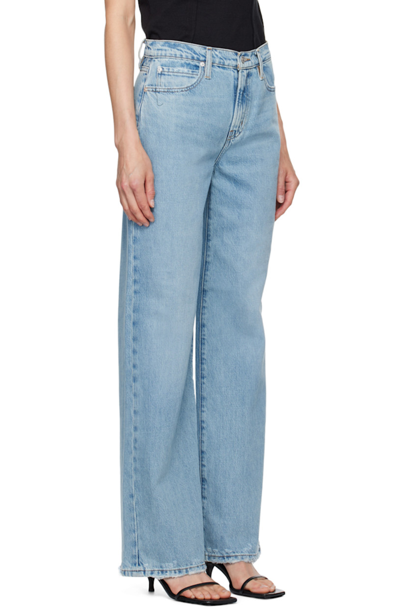 Wide-leg non-stretch regenerative cotton- and postconsumer recycled cotton-blend denim jeans. Fading, whiskering, and subtle distressing throughout. 

· High-rise
· Belt loops
· Five-pocket styling
· Zip-fly
· Frayed edges at cuffs
· Logo-engraved silver-tone hardware
· Contrast stitching in tan

Supplier color: Ziggy