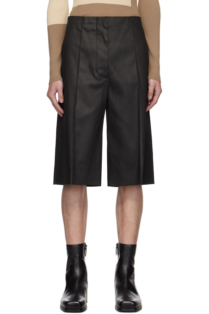 Oversized coated stretch denim shorts. Rivets throughout.

· Belt loops
· Four-pocket styling
· Zip-fly
· Pinched seams at legs

Supplier color: Black