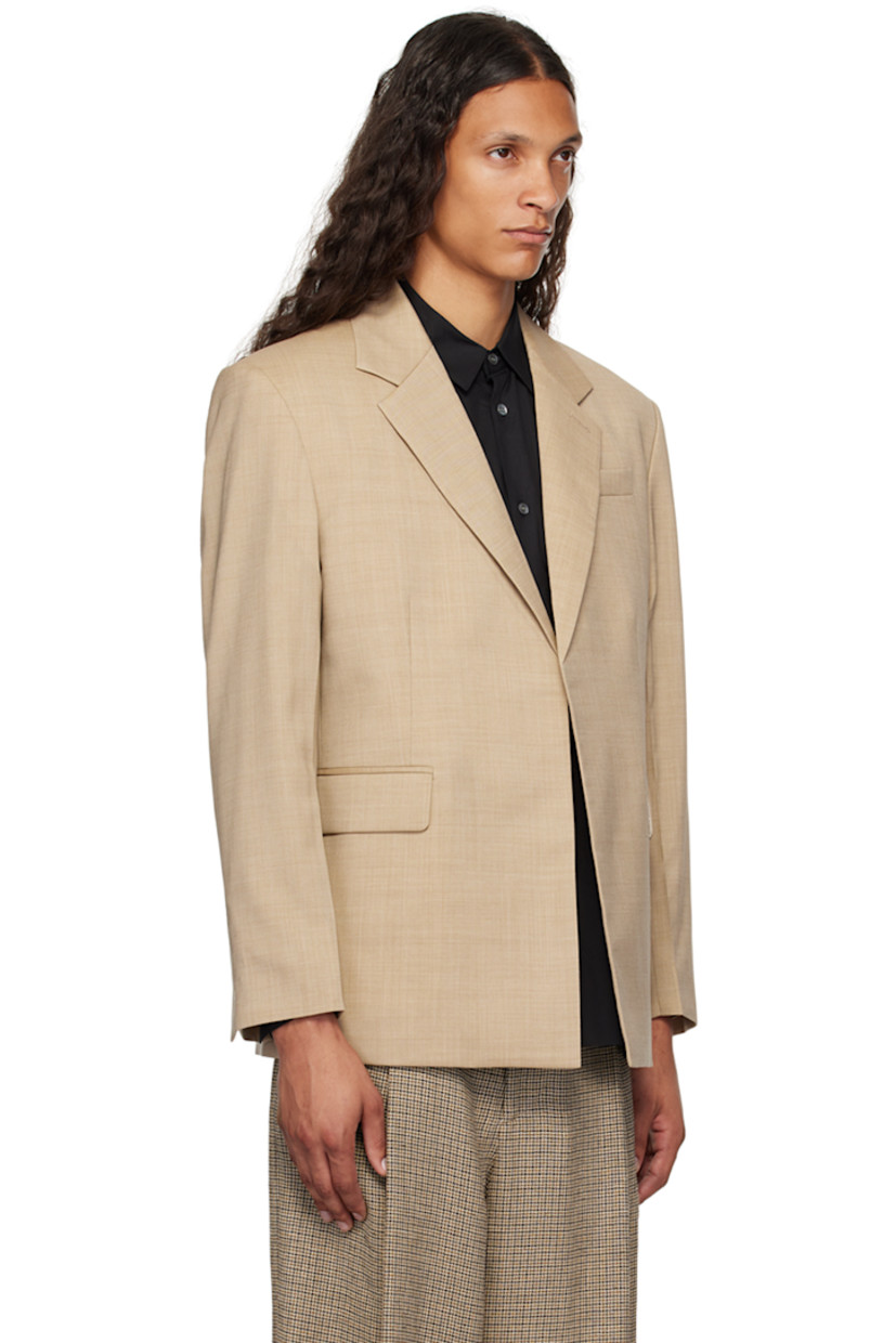 Virgin wool twill blazer. 

· Notched lapel 
· Open front 
· Welt pocket and flap pockets 
· Padded shoulders 
· Mock three-button surgeon's cuffs 
· Welt pockets at interior
· Full viscose satin lining 

Supplier color: Taupe
