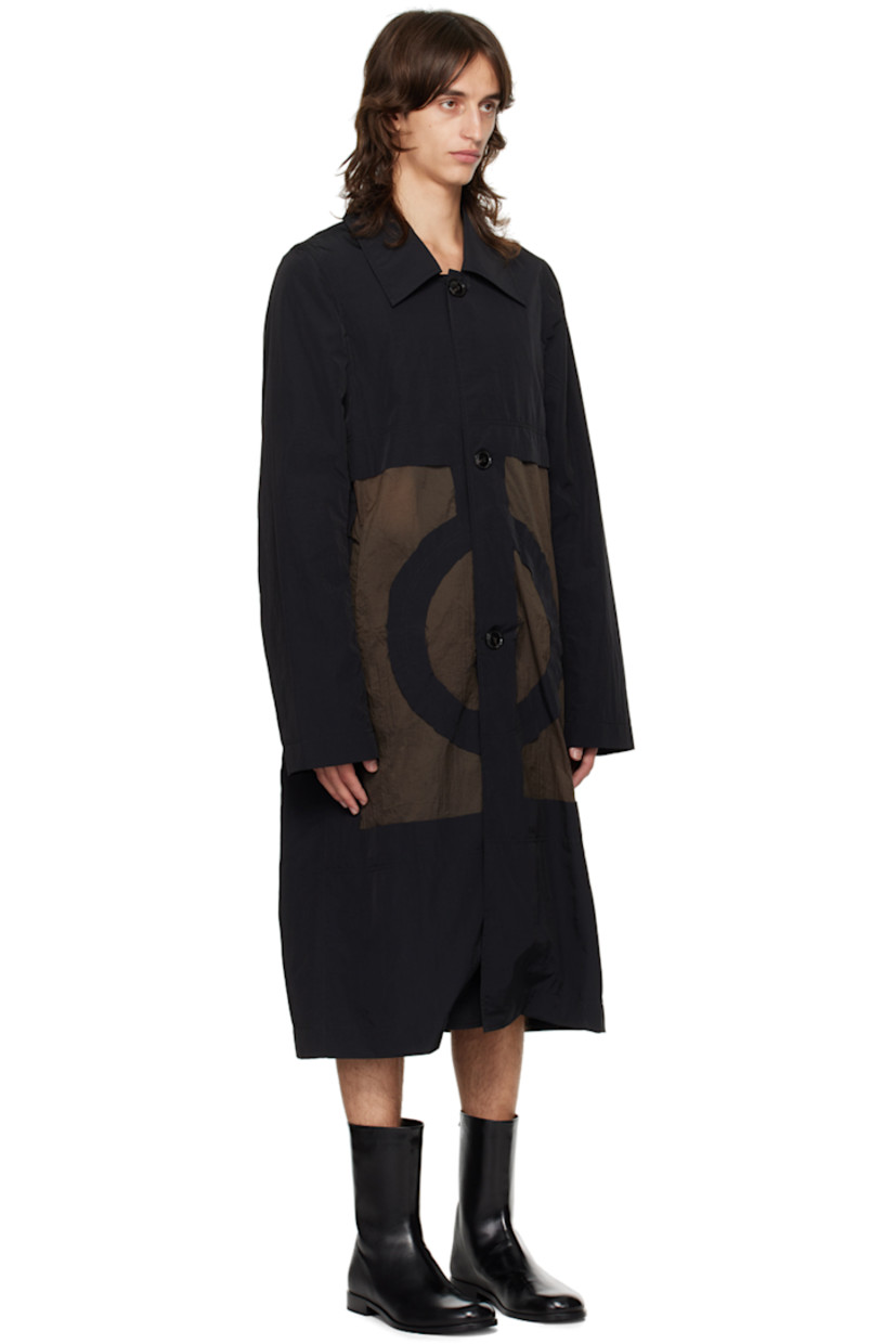 Nylon taffeta and crinkled nylon taffeta coat. 

· Paneled construction
· Spread collar
· Button closure
· Raw edges at front
· Welt pockets
· Locker loop at back collar
· Central vent at back hem

Supplier color: Black/Khaki grey