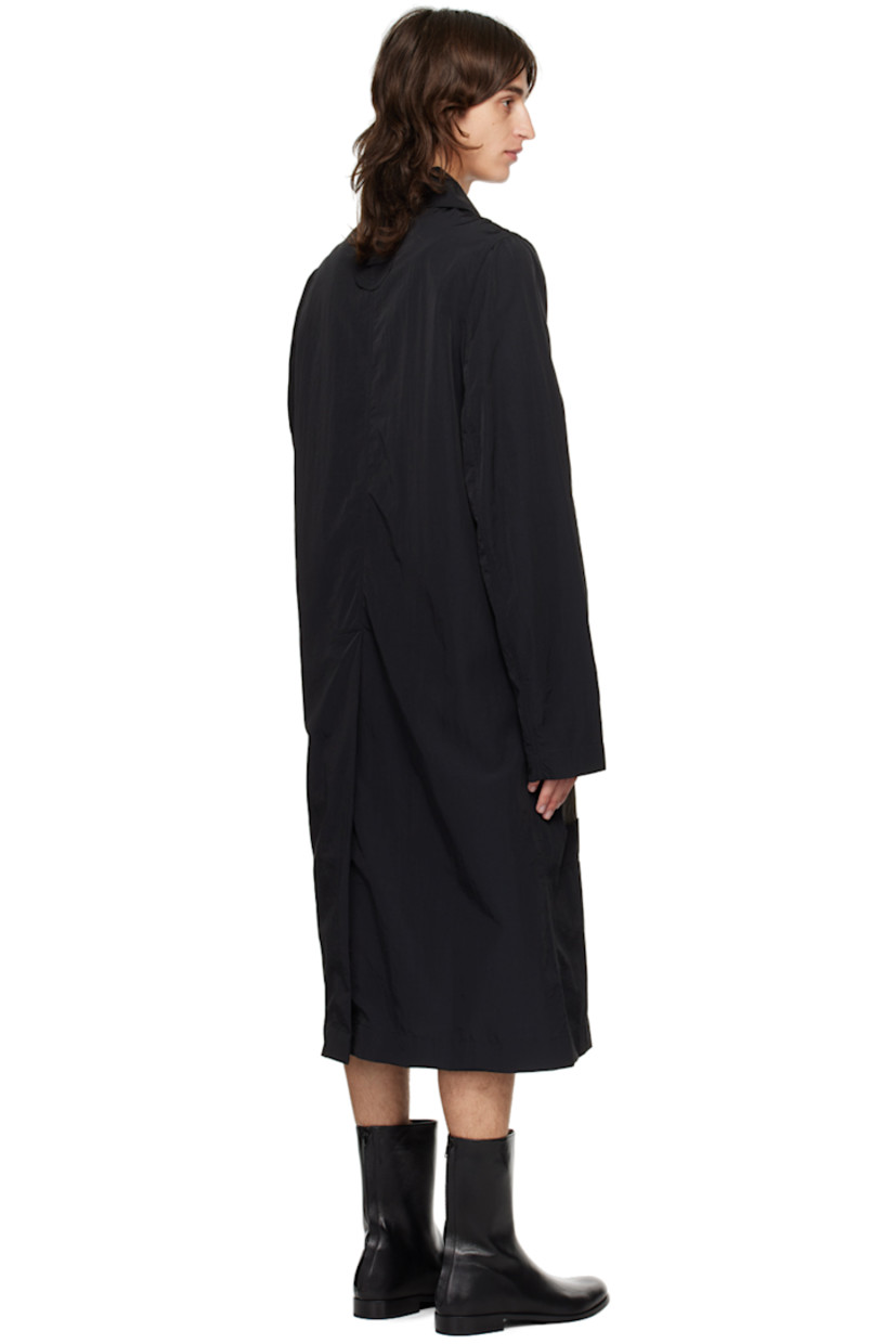 Nylon taffeta and crinkled nylon taffeta coat. 

· Paneled construction
· Spread collar
· Button closure
· Raw edges at front
· Welt pockets
· Locker loop at back collar
· Central vent at back hem

Supplier color: Black/Khaki grey