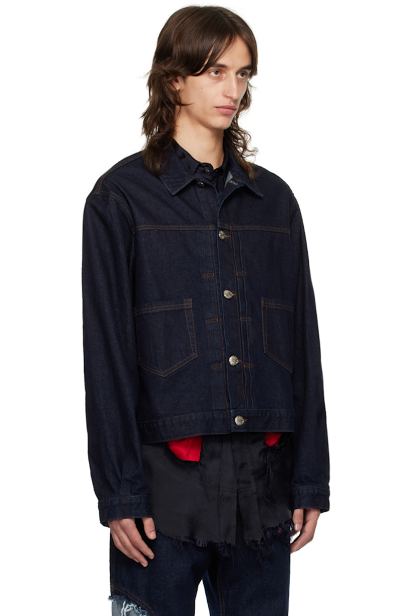 Non-stretch recycled cotton-blend denim jacket. 

· Spread collar
· Button closure
· Knife pleats at front
· Patch pockets
· Adjustable single-button barrel cuffs
· Logo patch at back hem
· Logo-engraved silver-tone hardware
· Contrast stitching in brown

Supplier color: Indigo blue wash