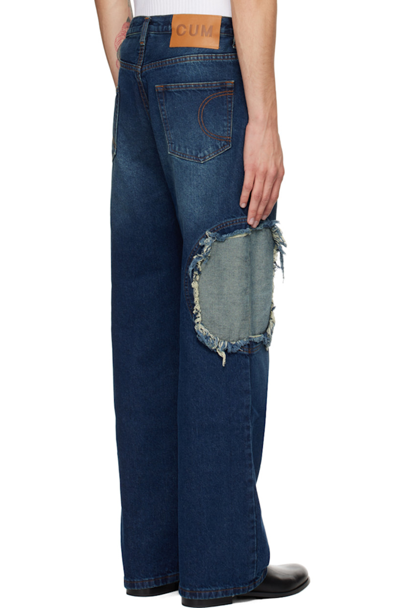 Non-stretch recycled cotton-blend denim jeans. Fading throughout.

· Belt loops
· Five-pocket styling
· Button-fly
· Inset panel with frayed edges at leg
· Logo patch at back waistband
· Logo-engraved silver-tone hardware
· Contrast stitching in brown

Supplier color: Mid-blue wash