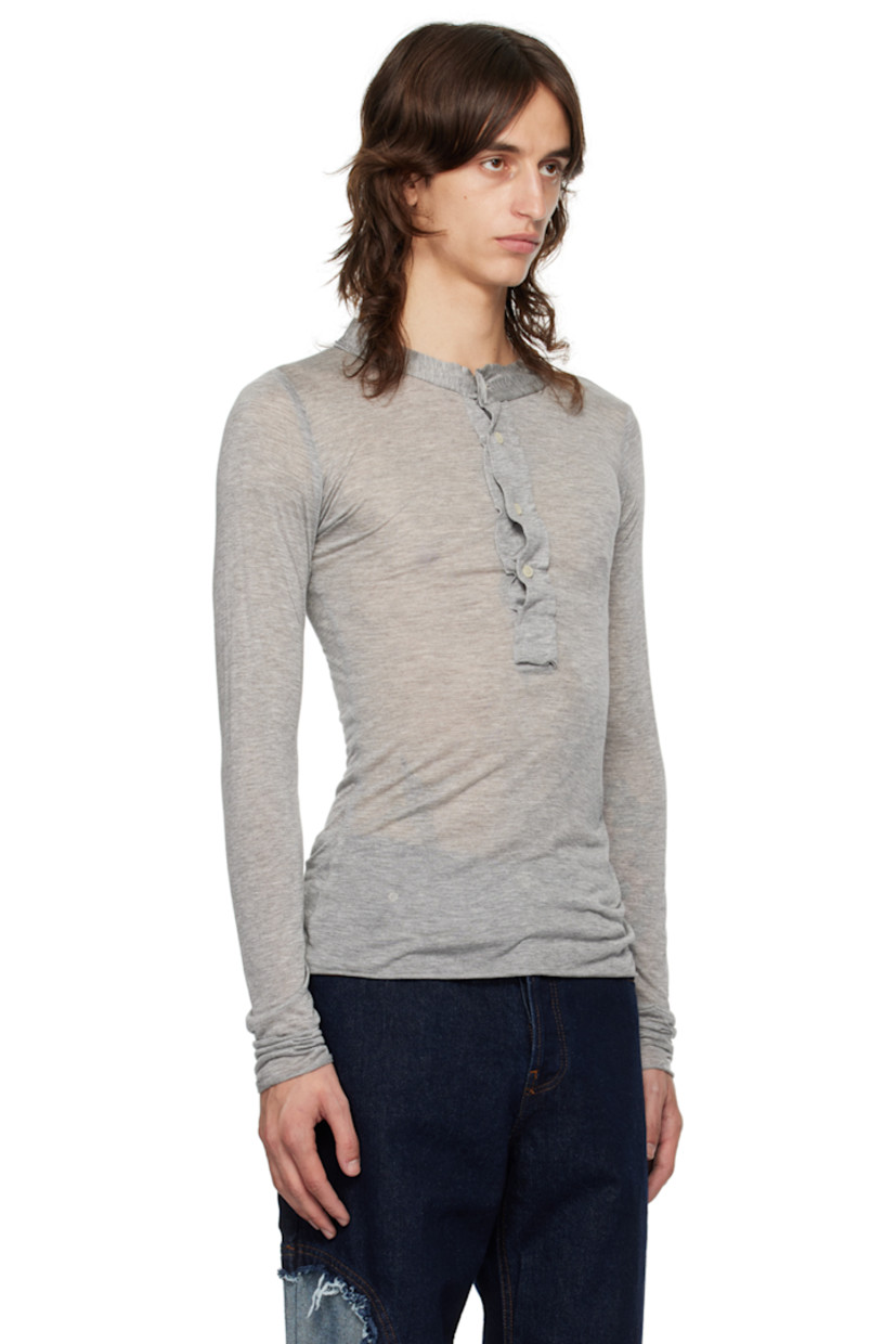 Semi-sheer modal jersey henley. Raw edges throughout.

· Crewneck
· Four-button placket

Supplier color: Grey marl