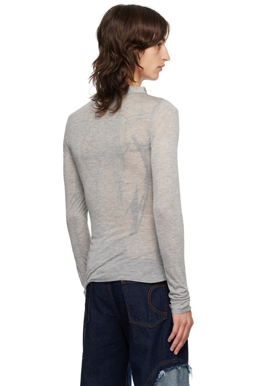 Semi-sheer modal jersey henley. Raw edges throughout.

· Crewneck
· Four-button placket

Supplier color: Grey marl