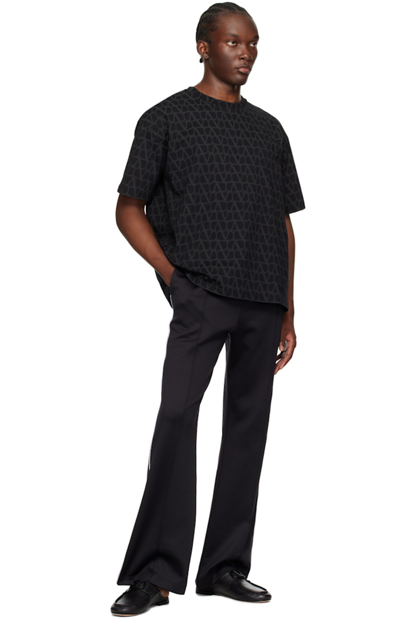 Nylon- and cotton-blend jersey sweatpants. 

· Concealed drawstring at elasticized waistband
· Three-pocket styling
· Pinched seams at front 
· Piping at outseams 
· Logo hardware at back pocket

Supplier color: Nero/Avorio
