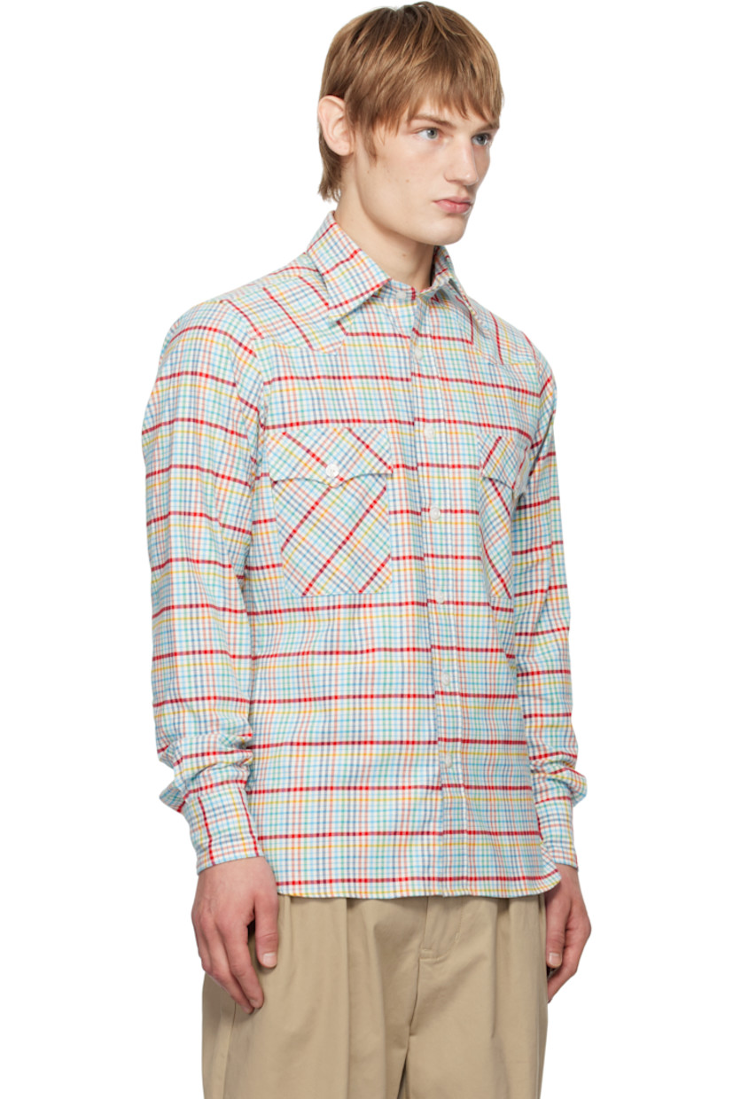 Brushed basket-woven cotton shirt. Check pattern throughout. 

· Spread collar 
· Button closure 
· Patch pocket
· Shirttail hem 
· Pleated single-button barrel cuffs 
· Mother-of-pearl hardware 

Supplier color: Multi