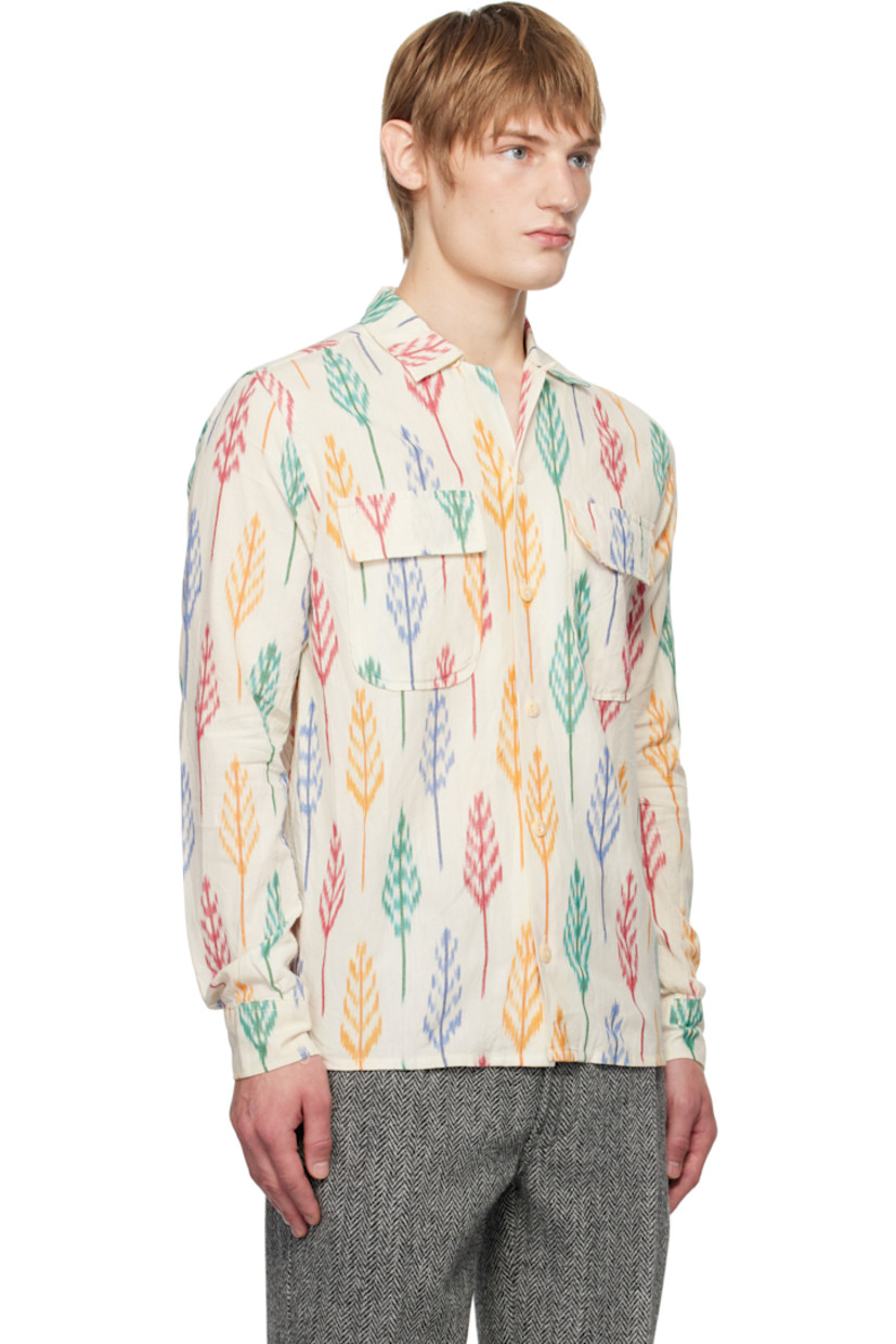 Handcrafted brushed basket-woven cotton shirt. 

· Loose-fit
· Open spread collar
· Button closure 
· Flap pockets 
· Pleated single-button barrel cuffs 
· Mother-of-Pearl hardware

Supplier color: Ecru multi