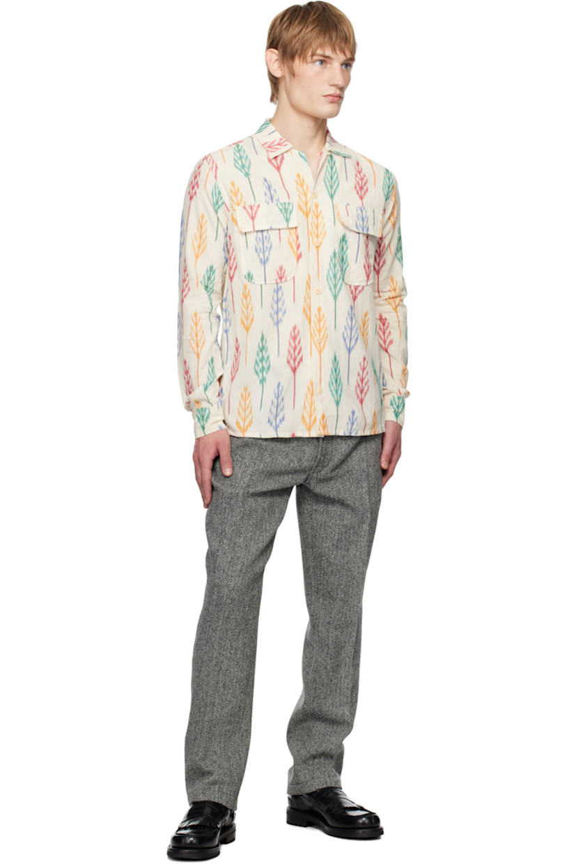 Handcrafted brushed basket-woven cotton shirt. 

· Loose-fit
· Open spread collar
· Button closure 
· Flap pockets 
· Pleated single-button barrel cuffs 
· Mother-of-Pearl hardware

Supplier color: Ecru multi