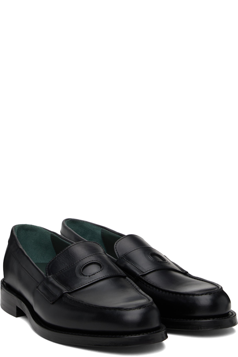 Handcrafted buffed leather loafers in black.

· Moc toe
· Strap with cutout at vamp
· Logo embossed at padded leather footbed
· Buffed leather and suede lining
· Topstitching at Goodyear welt
· Stacked leather block heel with rubber injection
· Polished leather sole

Supplier color: Black