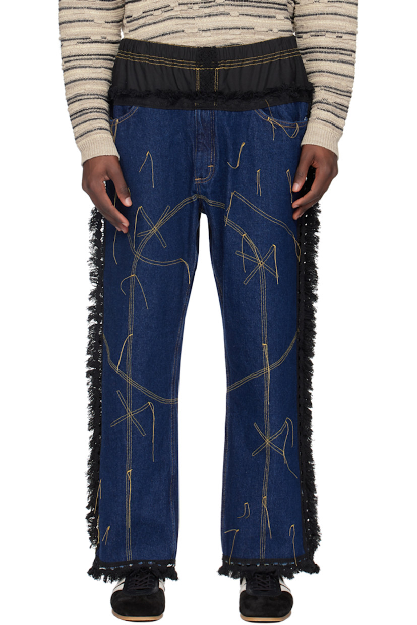Non-stretch denim jeans. Frayed edges and loose thread detailing throughout. 

· Paneled construction 
· Elasticized waistband 
· Two-pocket styling 
· Contrast stitching in yellow 

Available exclusively at SSENSE.

Supplier color: Weft