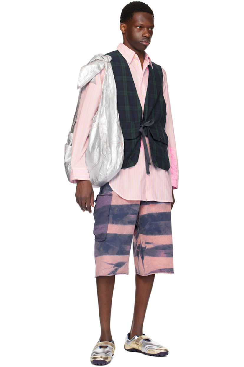 Cotton fleece shorts. Fading and stripes printed throughout. 

· Elasticized waistband 
· Rolled edge at cuffs 
· Patch pocket at outseams 

Available exclusively at SSENSE.

Supplier color: Warf
