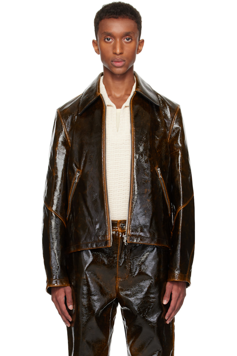 Crackled PU-coated wool twill jacket. Fading throughout. 

· Boxy-fit
· Spread collar
· Zip closure
· Zip pockets
· Cropped hem
· Welt pocket at interior 
· Full satin lining 

Supplier color: Worn coated wool
