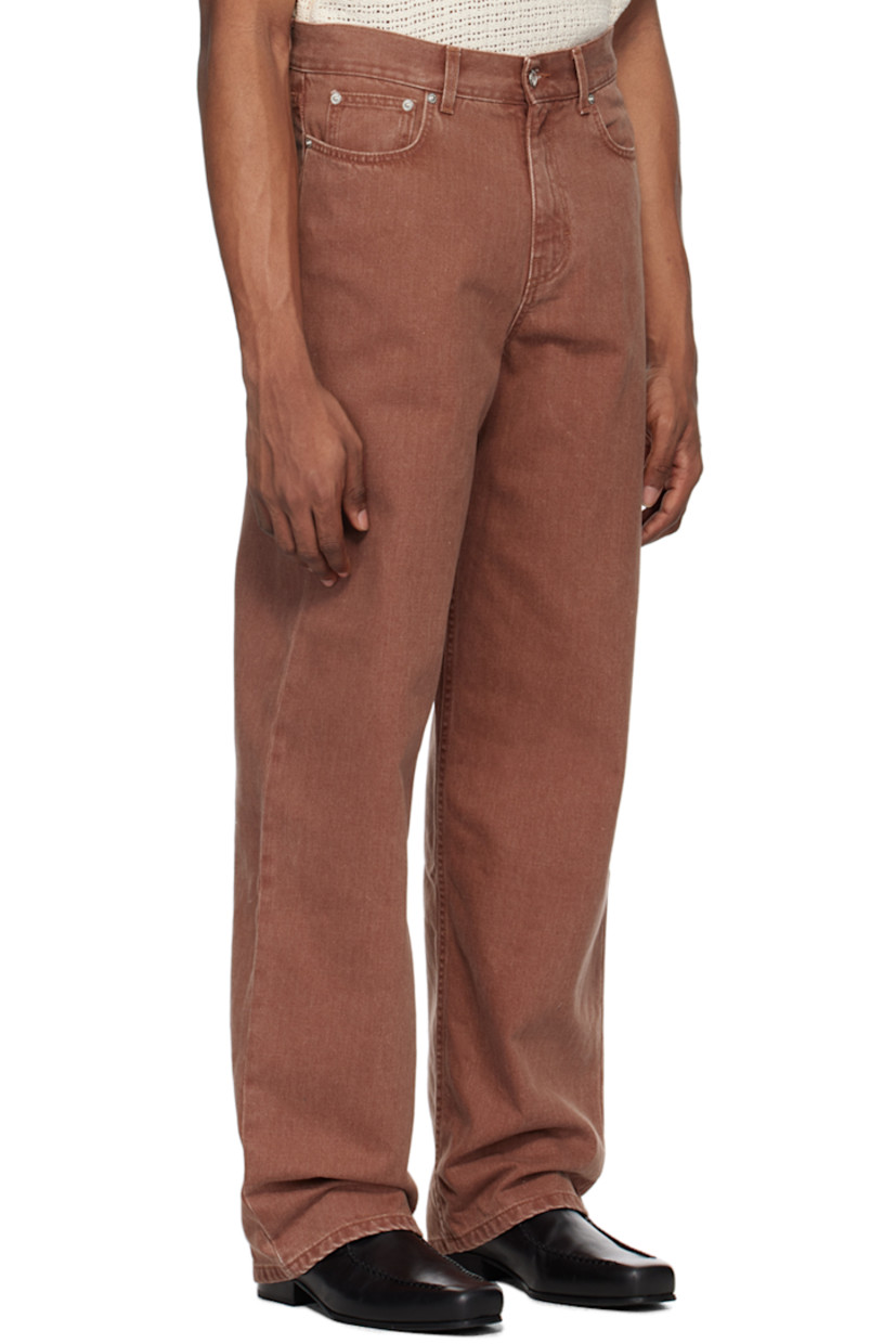 Relaxed-fit wide-leg non-stretch denim jeans. 

· High-rise
· Belt loops
· Five-pocket styling
· Button-fly
· Suede logo patch at back
· Logo-engraved silver-tone hardware

Supplier color: Faded red