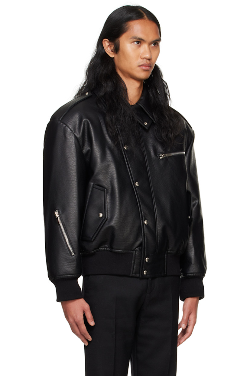 Padded grained faux-leather jacket.

· Spread collar
· Press-stud throat guard
· Zip closure with press-stud placket
· Zip pocket and flap pockets
· Rib knit hem and cuffs
· Press-stud epaulets
· Zip hardware at sleeve
· Logo hardware at back collar
· Full quilted satin lining

Supplier color: Black