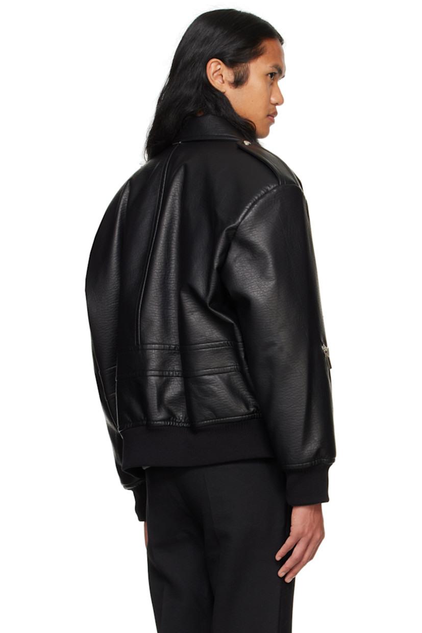 Padded grained faux-leather jacket.

· Spread collar
· Press-stud throat guard
· Zip closure with press-stud placket
· Zip pocket and flap pockets
· Rib knit hem and cuffs
· Press-stud epaulets
· Zip hardware at sleeve
· Logo hardware at back collar
· Full quilted satin lining

Supplier color: Black