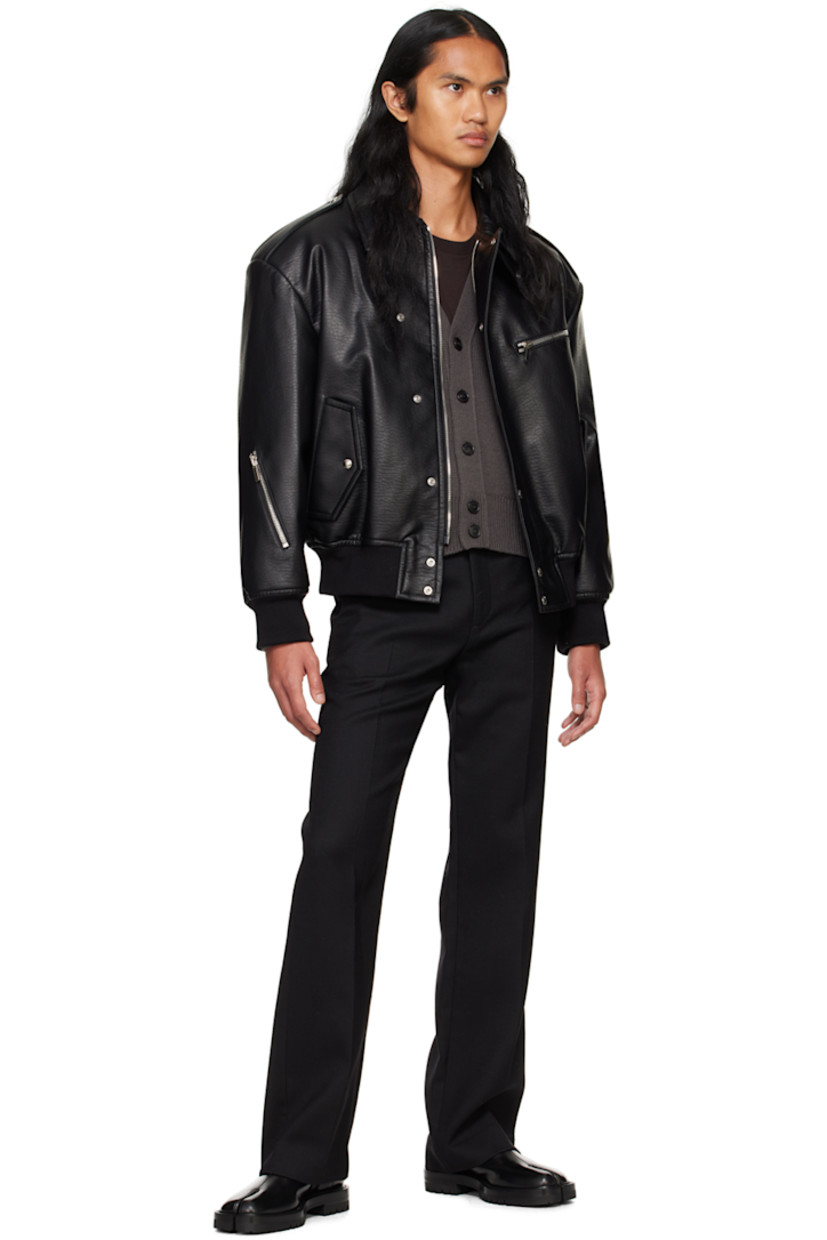 Padded grained faux-leather jacket.

· Spread collar
· Press-stud throat guard
· Zip closure with press-stud placket
· Zip pocket and flap pockets
· Rib knit hem and cuffs
· Press-stud epaulets
· Zip hardware at sleeve
· Logo hardware at back collar
· Full quilted satin lining

Supplier color: Black