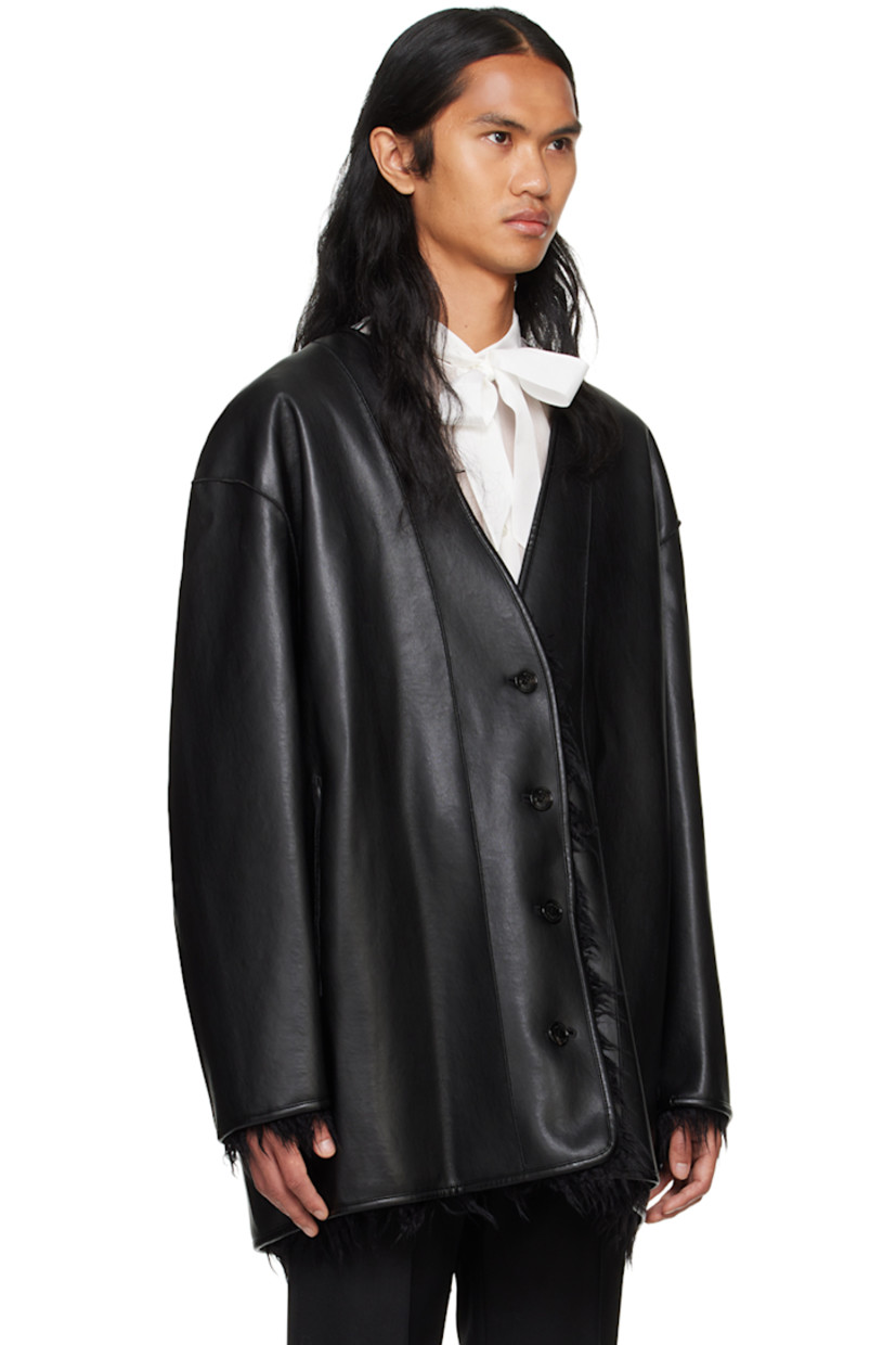 Reversible buffed faux-leather jacket. Pinched seams throughout.

Reverse in black faux-fur.

· Y-neck
· Button closure
· Seam pockets
· Logo hardware at back and inner collar

Supplier color: Black
