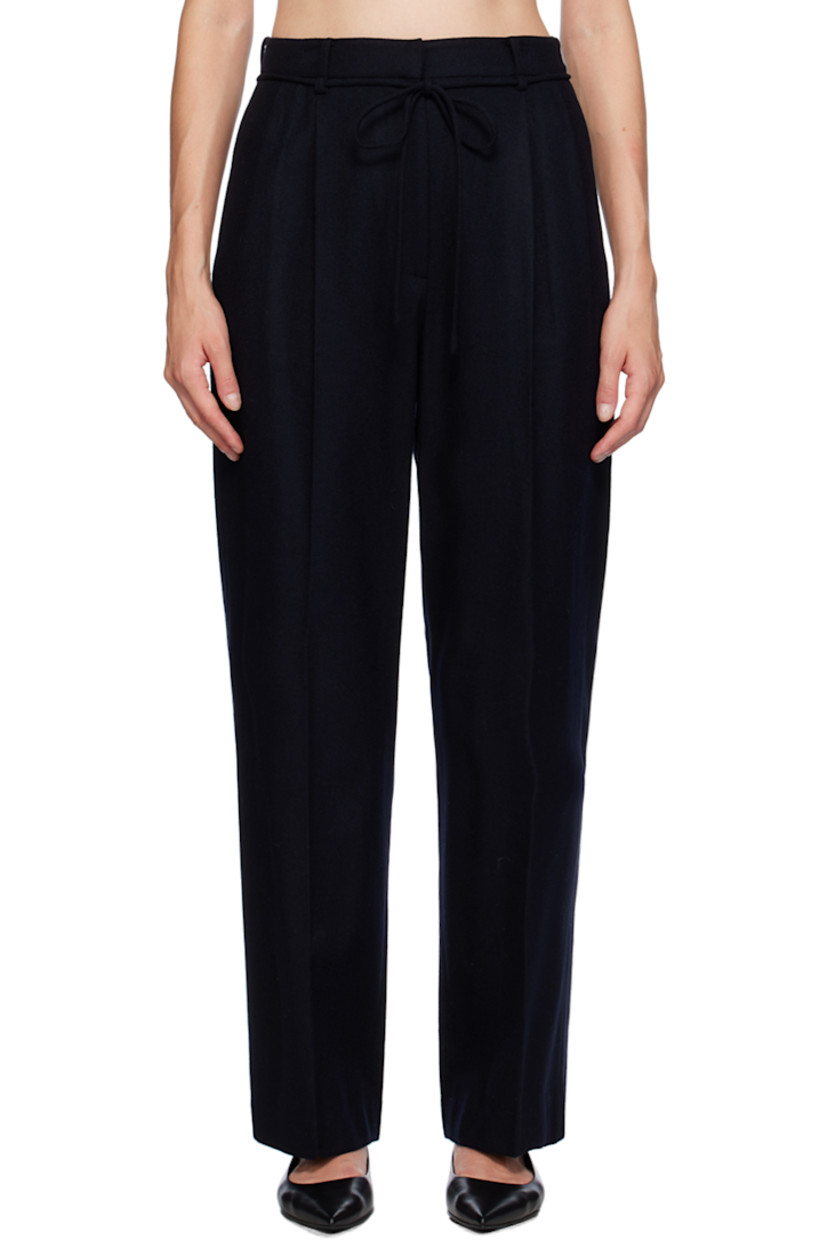 Straight-leg wool-blend flannel trousers.

· Belt loops 
· Drawstring at waist
· Four-pocket styling
· Zip-fly
· Pleats at front
· Creased legs 
· Partial satin lining

Supplier color: Navy