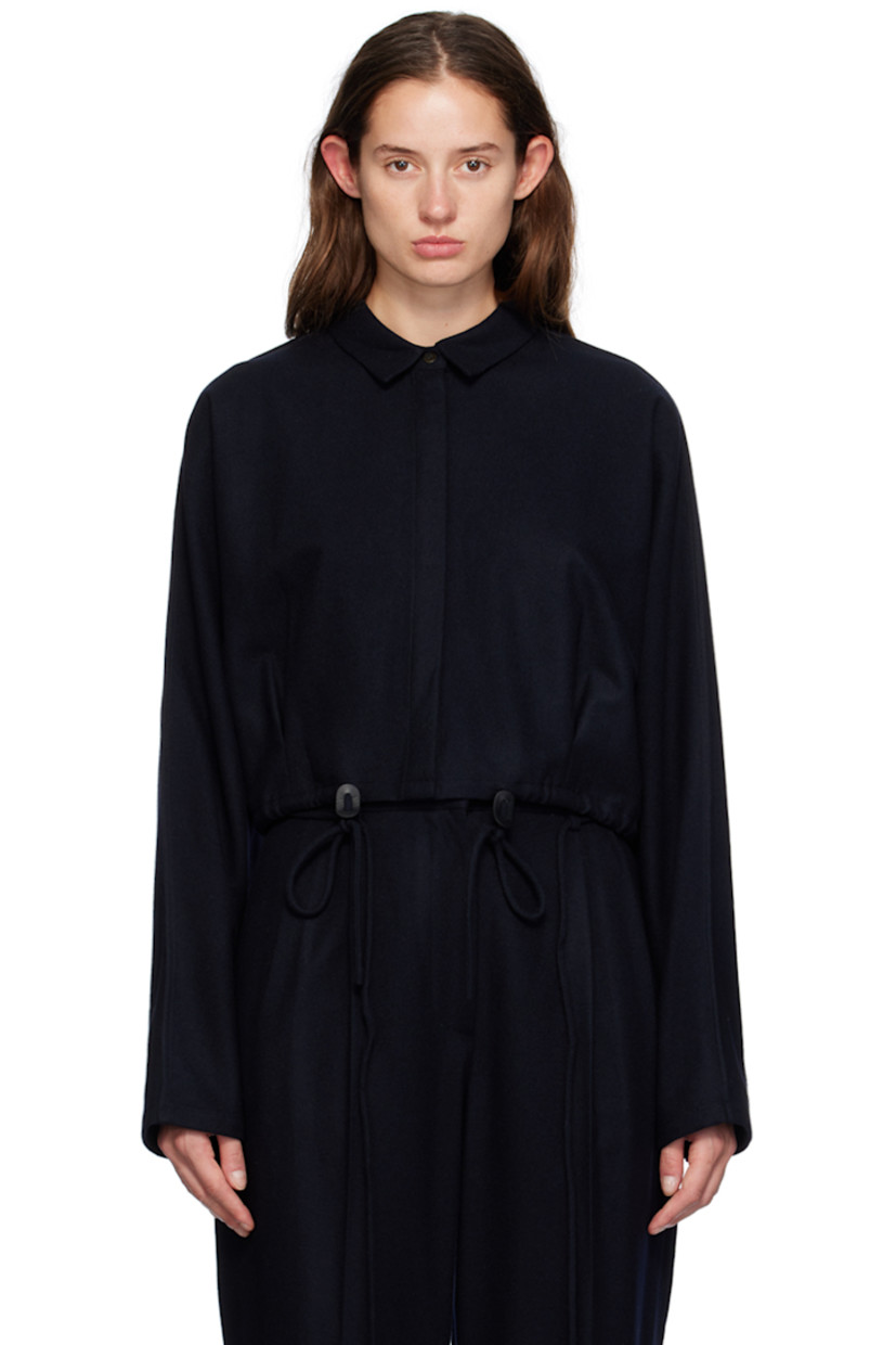 Wool-blend flannel shirt. 

· Spread collar
· Concealed button closure 
· Cord-lock drawstring at cropped hem 
· Adjustable button fastening at cuffs 
· Inverted box pleats at back hem

Supplier color: Navy