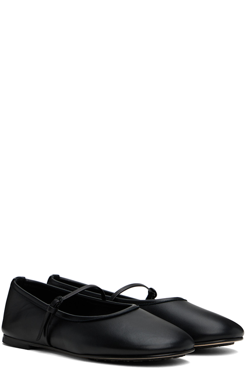 Handcrafted nappa leather ballerina flats in black.

· Pin-buckle strap at vamp
· Logo embossed at padded leather insole
· Buffed leather lining
· Suede and logo-treaded rubber sole

Supplier color: Black