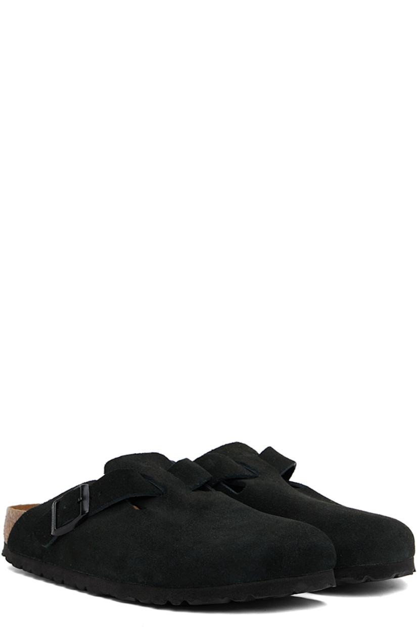 Suede slip-on loafers in black.

· Pin-buckle strap at vamp
· Logo embossed at inner side
· Logo printed at cushioned molded suede footbed
· Cork-latex midsole
· Treaded foam rubber sole
· Logo-engraved black hardware

Supplier color: Black