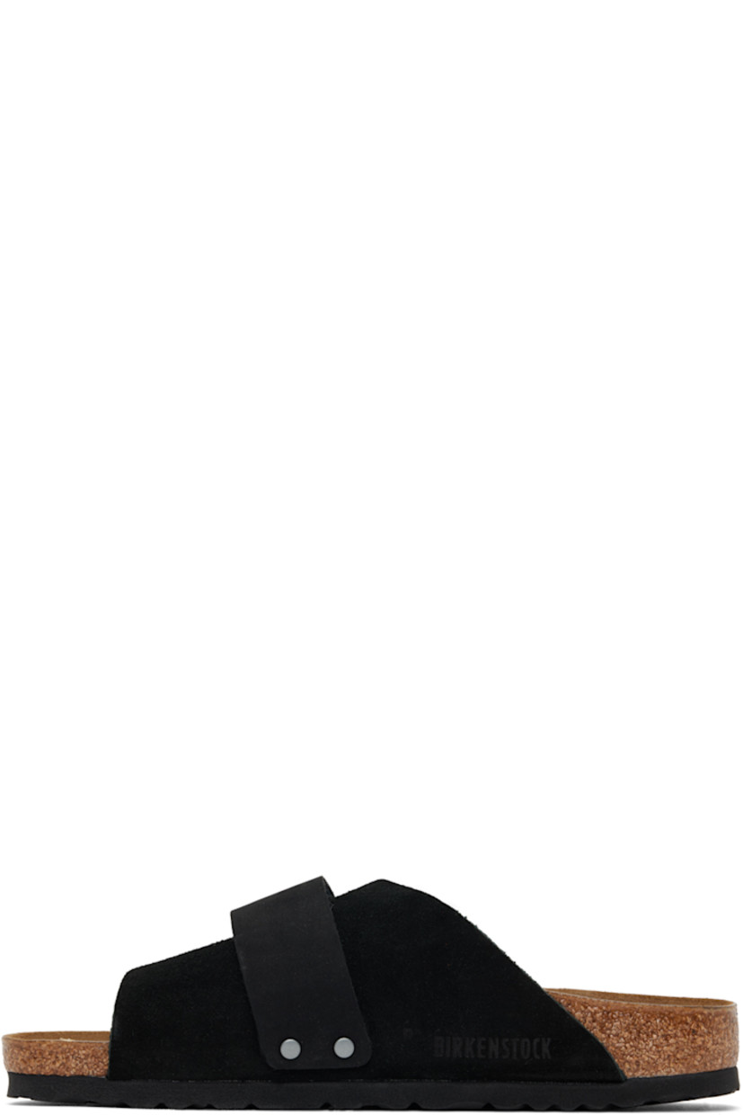 Suede and nubuck slip-on flat sandals in black.

· Open toe
· Velcro strap at vamp 
· Logo embossed at vamp and inner side
· Logo printed at molded suede footbed
· Latex-cork midsole
· Treaded EVA rubber sole

Supplier color: Black