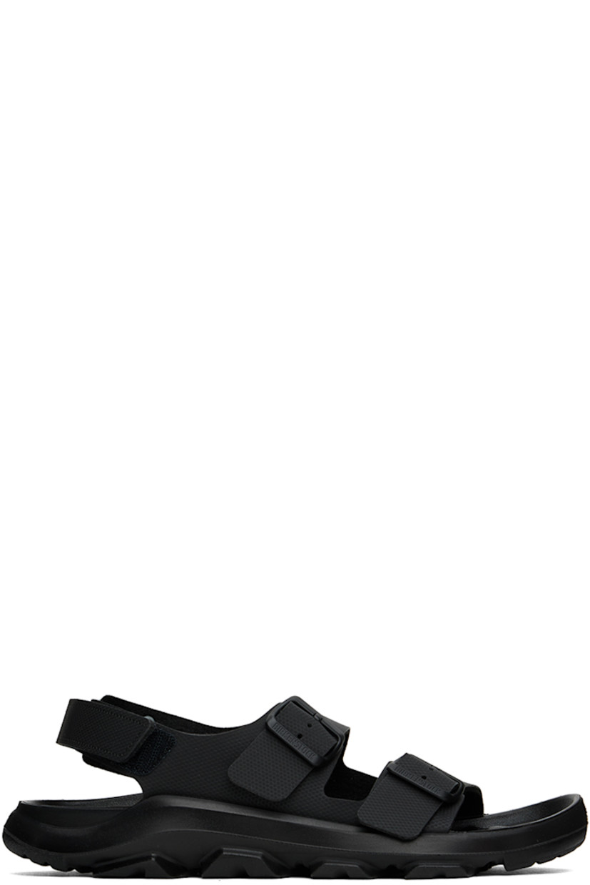 Durable textured Birko-Flor® faux-leather sandals in black.

· Open toe
· Pin-buckle straps at vamp
· Logo embossed at inner side
· Velcro strap at heel
· Logo embossed at waterproof molded PU footbed
· Treaded PU sole

Supplier color: Black
