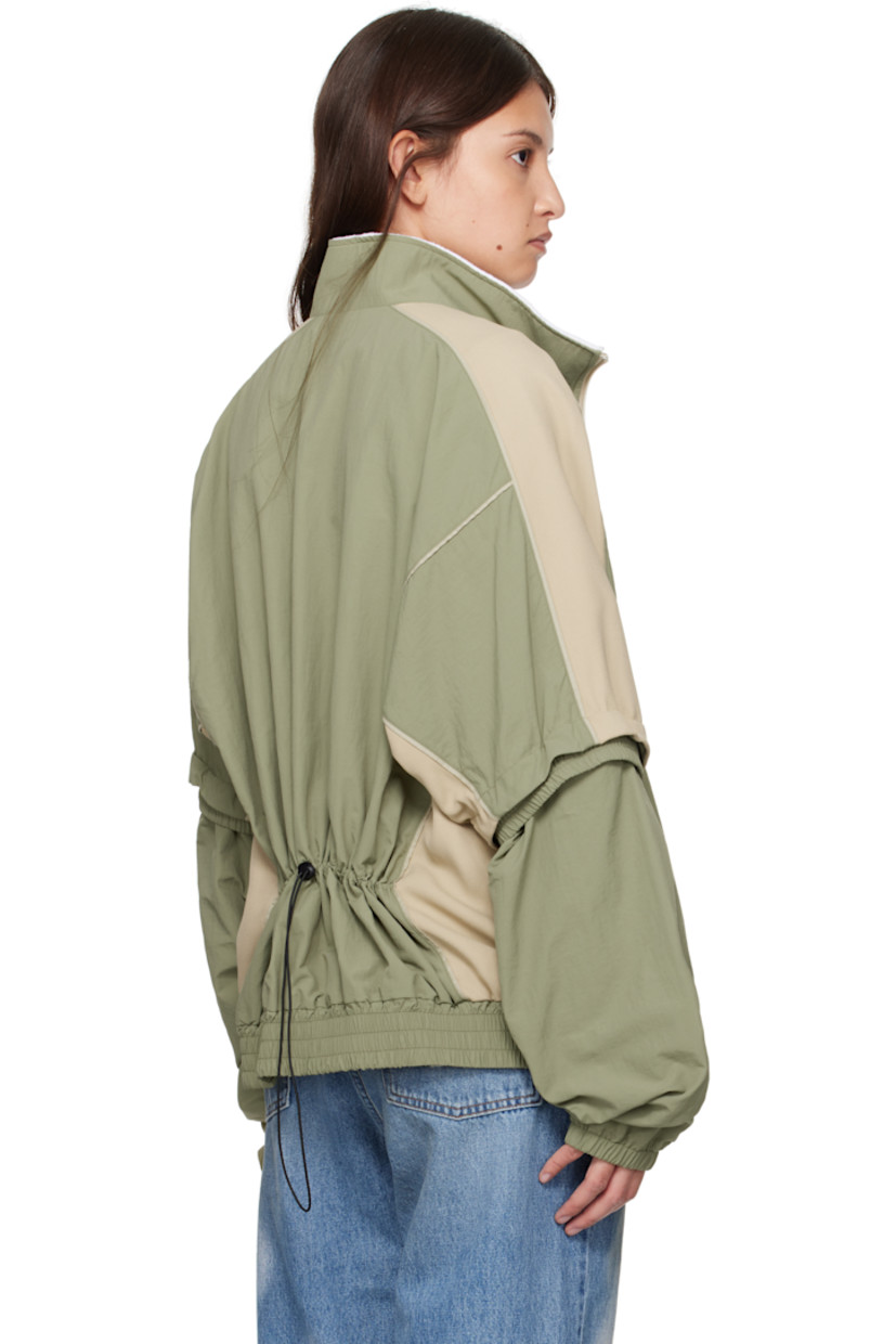 Nylon canvas and viscose-blend cady jacket.

· Fleece trim at mock neck
· Zip closure
· Welt pockets
· Elasticized hem and cuffs
· Logo printed at shoulder 
· Raglan sleeves
· Detachable panel at sleeves
· Bungee-style drawstring at back
· Mesh lining

Supplier color: Sage